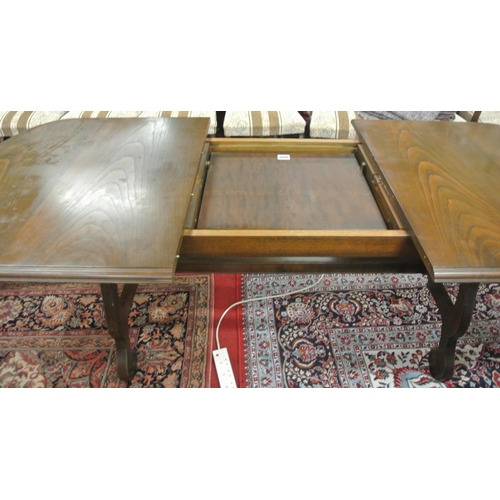 100 - Edwardian style oak extending D-end dining table with extra leaf inset, legs and stretcher with scro... 