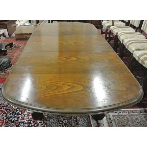 100 - Edwardian style oak extending D-end dining table with extra leaf inset, legs and stretcher with scro... 