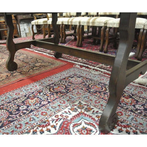 100 - Edwardian style oak extending D-end dining table with extra leaf inset, legs and stretcher with scro... 