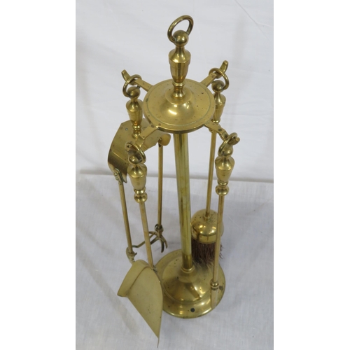 103 - Edwardian style brass four piece companion set on stand