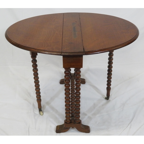 104 - Victorian mahogany Sutherland table with D-shaped drop leaves, pull-out gateleg supports, ball turne... 