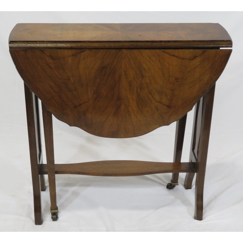 129 - Victorian walnut Pembroke table with D-shaped drop leaves, pull-out gateleg supports, shaped sides a... 