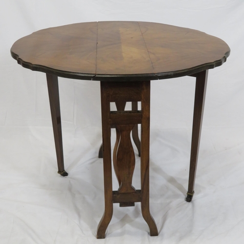 129 - Victorian walnut Pembroke table with D-shaped drop leaves, pull-out gateleg supports, shaped sides a... 