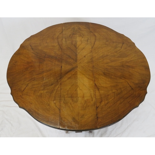 129 - Victorian walnut Pembroke table with D-shaped drop leaves, pull-out gateleg supports, shaped sides a... 