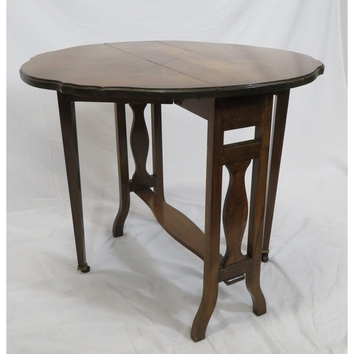 129 - Victorian walnut Pembroke table with D-shaped drop leaves, pull-out gateleg supports, shaped sides a... 