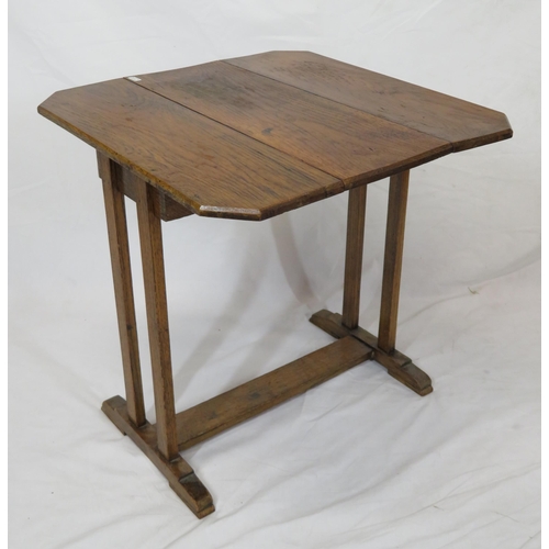 14 - Edwardian oak Sutherland table with drop leaves, on plinths