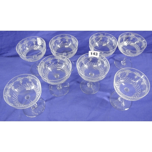 143 - Set of eight Edwardian etched champagne saucers, stemmed with foliate decoration