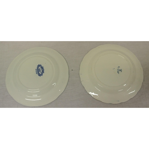 148 - Two blue & white scenic decorated plates with wavy borders