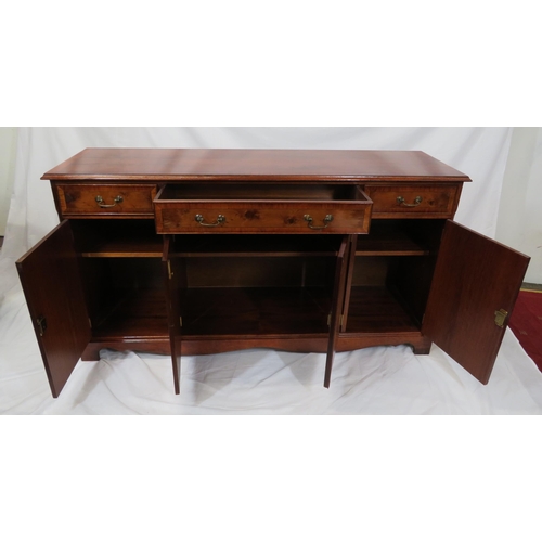 15 - Edwardian style inlaid yew sideboard with three frieze drawers, shelved presses under, on bracket fe... 