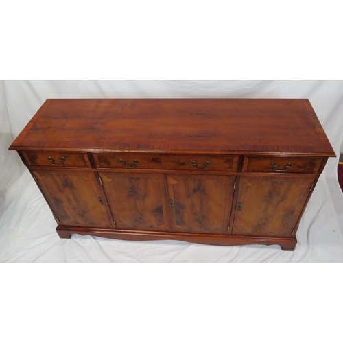 15 - Edwardian style inlaid yew sideboard with three frieze drawers, shelved presses under, on bracket fe... 