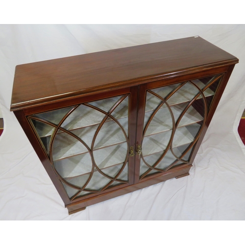 150 - Edwardian inlaid mahogany bookcase or cabinet with glazed doors, ornate fretwork, shelved interior, ... 