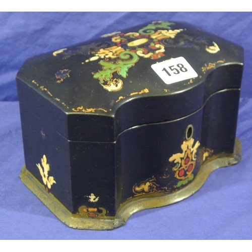 158 - Victorian papiermache tea caddy with serpentine borders, foliate decoration, and fitted interior