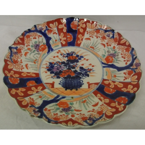 177 - Pair of Imari chargers with scalloped borders, ornate deep blue and burnt ochre foliate decoration