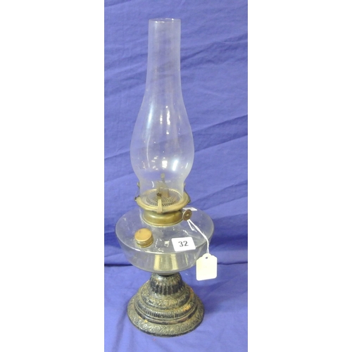 32 - Victorian style glass table oil lamp with shaped metal base