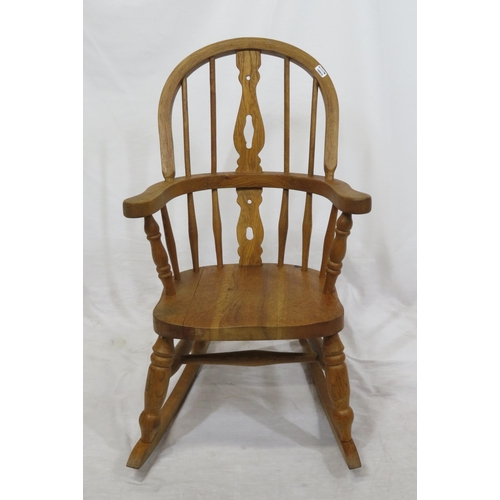 377 - Victorian style child's Windsor rocking chair with turned rails and shaped arms