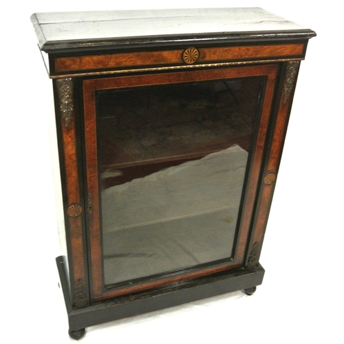 38 - Victorian inlaid and ebonized floor bookcase with ormolu mounts, and bun feet