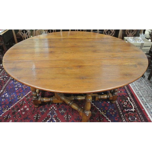 45 - Victorian style pine hunt or wake table with D-shaped drop leaves, pull-out gateleg supports, turned... 