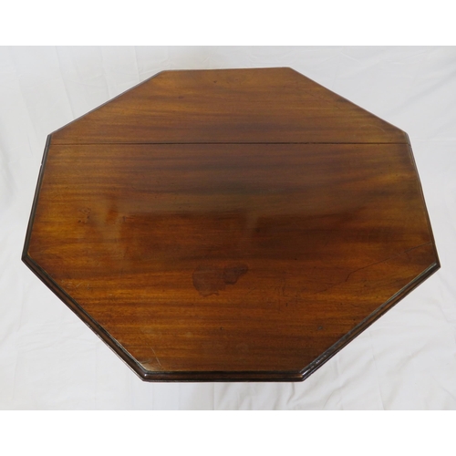 59 - Edwardian mahogany hexagonal table with glazed press under, on shaped legs with castors