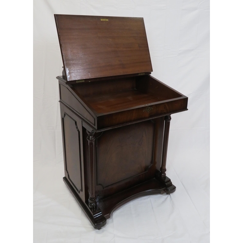 65 - Edwardian mahogany davenport with lift-up lid, side drawers with brass drop handles, on plinth