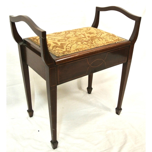 69 - Edwardian mahogany piano stool with upholstered lift-up lid, shaped arms, on inlaid tapering legs