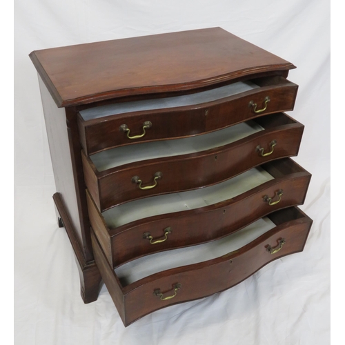 70 - Edwardian mahogany and walnut serpentine fronted chest of four drawers with brass drop handles, on b... 