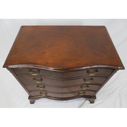 70 - Edwardian mahogany and walnut serpentine fronted chest of four drawers with brass drop handles, on b... 