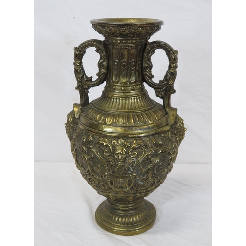 76 - Ornate baluster shaped gilded vase with ornate foliate figured and scroll decoration, on round stepp... 