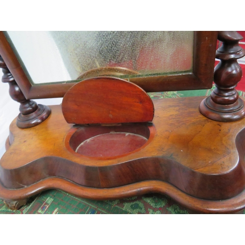 82 - Victorian walnut domed swivel mirror with barleytwist column, powder drawer, and serpentine base