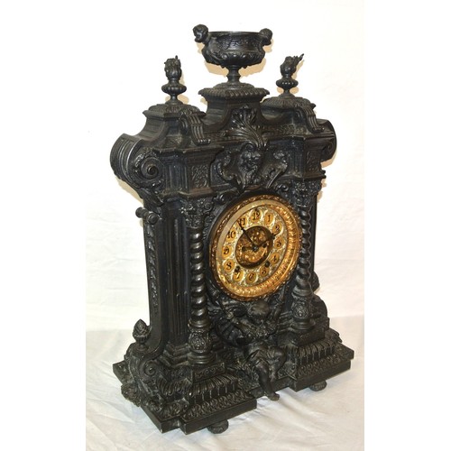 47 - Ornate cast metal mantle clock ornately decorated with vase finials, scrolls and foliage, ornate bra... 