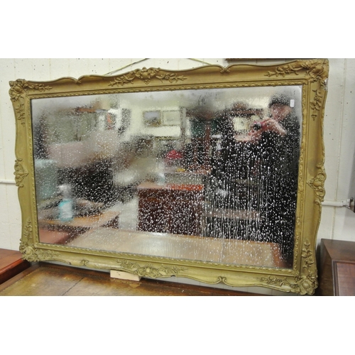 54 - Victorian style gilt framed wall mirror with scroll & foliate decoration