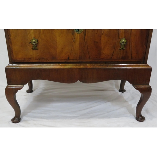 125 - Georgian crossbanded walnut chest on stand with three short & three long drawers, brass drop handles... 