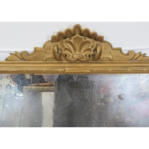 109 - Regency style gilt overmantle mirror with shell pediment