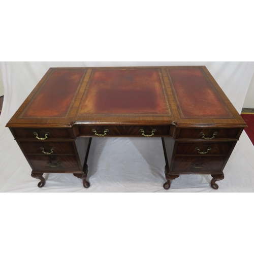 100 - Edwardian mahogany pedestal desk with seven drawers, leatherette inset, brass drop handles, on cabri... 