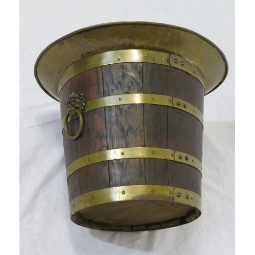 102 - Georgian style round bucket with brass rim and banding, lionmask brass drop handles