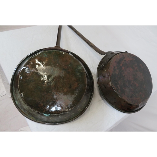 103 - Two Georgian style copper pans with long handles