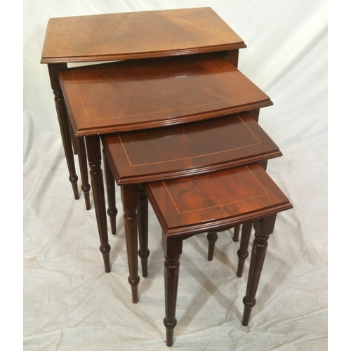 111 - Nest of four inlaid mahogany bow fronted tables with shaped borders & turned reeded tapering legs