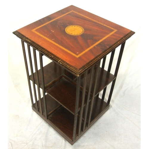 151 - Edwardian style inlaid & crossbanded mahogany revolving bookcase with shell motif & railed sides