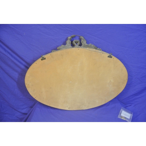 164 - Regency style oval gilt framed bevelled glass mirror with foliate decoration