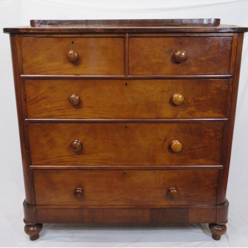 195 - Victorian mahogany chest of two short & three long drawers, with sarcophagus shaped top, bun handles... 