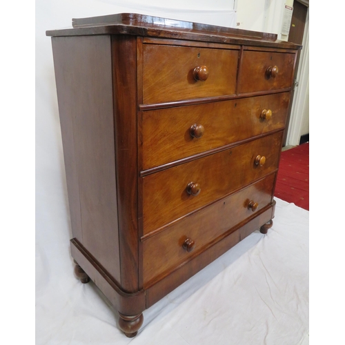 195 - Victorian mahogany chest of two short & three long drawers, with sarcophagus shaped top, bun handles... 