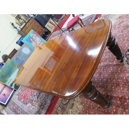 200 - Victorian mahogany extending dining table with two extra leaves inset, raised on baluster turned tap... 