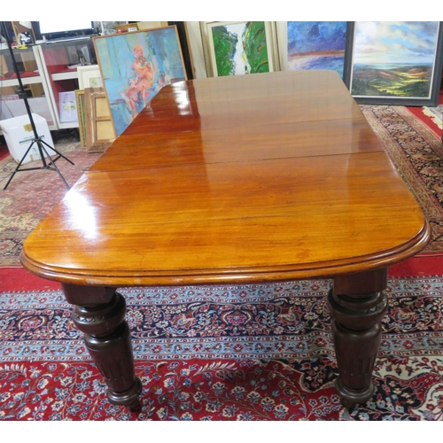 200 - Victorian mahogany extending dining table with two extra leaves inset, raised on baluster turned tap... 