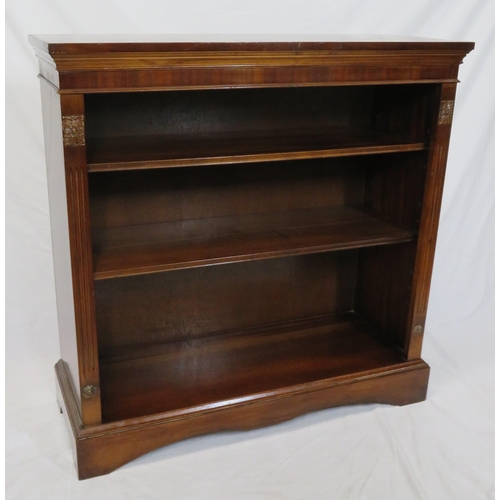 25 - Edwardian mahogany open bookcase with adjustable shelving, reeded borders, on shaped plinth