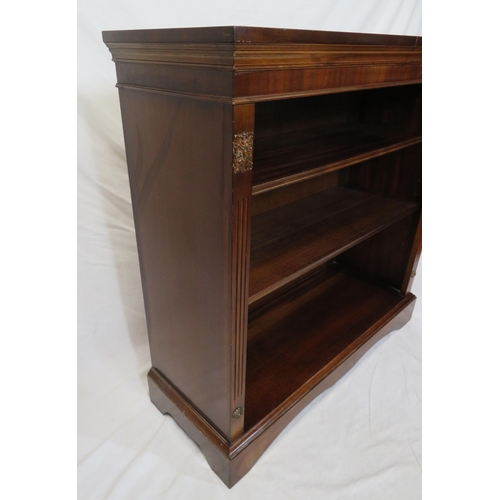 25 - Edwardian mahogany open bookcase with adjustable shelving, reeded borders, on shaped plinth