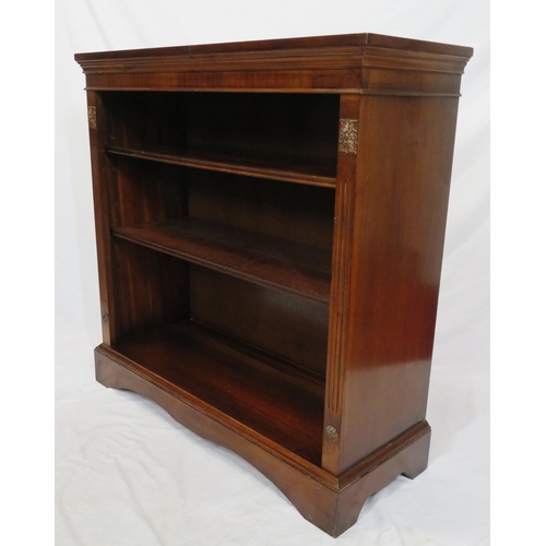 25 - Edwardian mahogany open bookcase with adjustable shelving, reeded borders, on shaped plinth