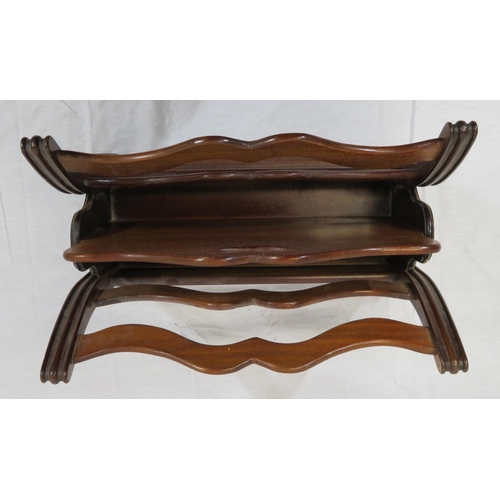 29 - Edwardian mahogany two section canterbury with shaped rails