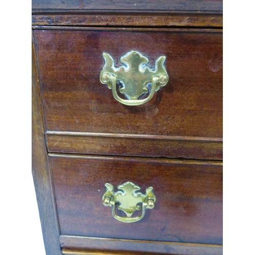 31 - Victorian mahogany small chest of drawers with brass drop handles, on bracket feet