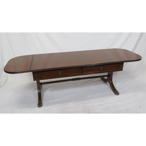 39 - Edwardian mahogany oblong coffee table with drop leaves, reeded borders, pull-out supports, on reede... 