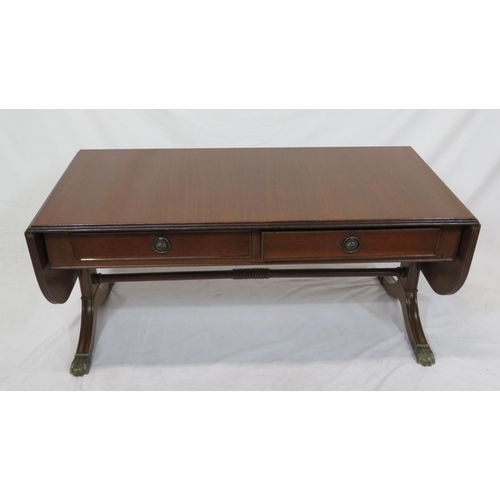 39 - Edwardian mahogany oblong coffee table with drop leaves, reeded borders, pull-out supports, on reede... 