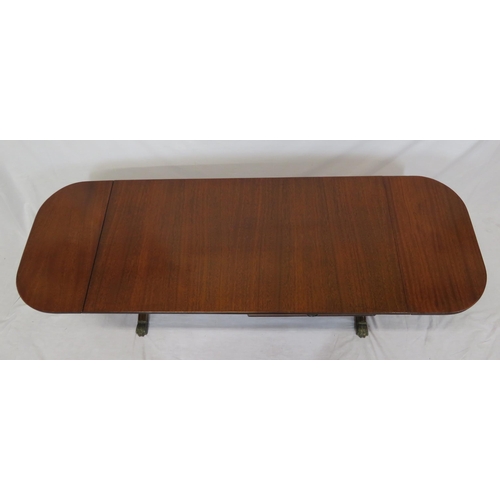 39 - Edwardian mahogany oblong coffee table with drop leaves, reeded borders, pull-out supports, on reede... 